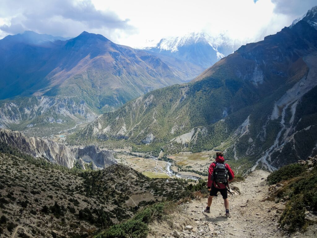 Solos trekker looking at mountain range in Nepal restricted Area